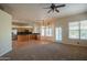 Open living room and kitchen area with carpeted floors at 8346 W Marlette Ave, Glendale, AZ 85305