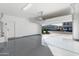 Attached garage with epoxy flooring and opener at 9814 E Palladium Dr, Mesa, AZ 85212