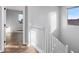 White staircase leading to upper level at 9814 E Palladium Dr, Mesa, AZ 85212