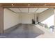 Two-car garage with extra storage and access door at 10220 E Thatcher Ave, Mesa, AZ 85212