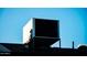 White AC unit atop the house's roof at 10601 N 26Th Pl, Phoenix, AZ 85028