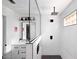Modern bathroom with a frameless glass shower and white finishes at 10601 N 26Th Pl, Phoenix, AZ 85028