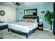 King-size bed, plenty of light, and modern decor at 10601 N 26Th Pl, Phoenix, AZ 85028