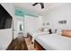 Guest bedroom with two twin beds and a loft-style ceiling at 10601 N 26Th Pl, Phoenix, AZ 85028