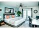Bright and airy bedroom with king-size bed and workspace at 10601 N 26Th Pl, Phoenix, AZ 85028