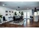 Modern dining room with a large table and fireplace at 10601 N 26Th Pl, Phoenix, AZ 85028