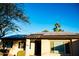 House exterior with solar panels and a partially visible entrance at 10601 N 26Th Pl, Phoenix, AZ 85028