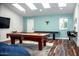 Pool table and air hockey in a spacious game room at 10601 N 26Th Pl, Phoenix, AZ 85028
