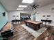 Game room with pool table, shuffleboard and bar at 10601 N 26Th Pl, Phoenix, AZ 85028