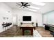 Game room with pool table, shuffleboard, and bar area at 10601 N 26Th Pl, Phoenix, AZ 85028