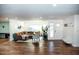 Spacious living room with sectional sofa and hardwood floors at 10601 N 26Th Pl, Phoenix, AZ 85028