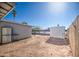 Backyard with a storage shed and dirt ground at 125 W 14Th Ave, Apache Junction, AZ 85120