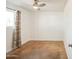 Spacious bedroom with neutral walls, ceiling fan, and large window at 125 W 14Th Ave, Apache Junction, AZ 85120