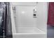 Bathroom with a tub/shower combo and built-in shelving at 1265 S Aaron -- # 359, Mesa, AZ 85209