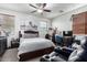 Bright bedroom with a queen-size bed and built-in workspace at 1265 S Aaron -- # 359, Mesa, AZ 85209
