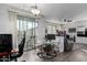 Combined dining and living area with patio access at 1265 S Aaron -- # 359, Mesa, AZ 85209