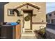 Townhome entrance with private wooden fence at 1265 S Aaron -- # 359, Mesa, AZ 85209