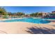 Inviting community pool with plenty of lounge chairs at 1265 S Aaron -- # 359, Mesa, AZ 85209
