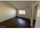 Bright bedroom with wood floors and a window at 1770 E Sandra Ter, Phoenix, AZ 85022