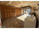 Interior garage with washer, dryer, and ample storage shelving at 1770 E Sandra Ter, Phoenix, AZ 85022