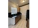 Kitchen with granite countertops and wood cabinets at 1770 E Sandra Ter, Phoenix, AZ 85022