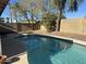 Relaxing kidney shaped pool, surrounded by a large backyard at 1770 E Sandra Ter, Phoenix, AZ 85022