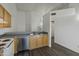 Kitchen with wood cabinets, stainless steel dishwasher, and stove at 19601 N 7Th St # 2026, Phoenix, AZ 85024