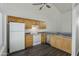 Well-lit kitchen featuring wood cabinets and appliances at 19601 N 7Th St # 2026, Phoenix, AZ 85024