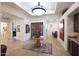 Bright and spacious entryway with high ceilings and tiled floors at 27440 N Alma School Pkwy # 38-5, Scottsdale, AZ 85262