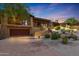 Beautiful home with desert landscaping and two-car garage at 27440 N Alma School Pkwy # 38-5, Scottsdale, AZ 85262