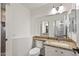 Small bathroom with toilet and granite countertop vanity at 4020 N 151St Dr, Goodyear, AZ 85395