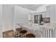 Kitchen island with granite countertop and wooden stools at 4020 N 151St Dr, Goodyear, AZ 85395