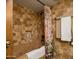 Relaxing bathroom with a tiled jacuzzi tub and shower at 4528 E Hobart St, Mesa, AZ 85205