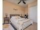 Bedroom with a full-size bed and built in closet at 4528 E Hobart St, Mesa, AZ 85205