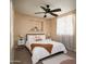 Serene bedroom featuring a queen-size bed and soft decor at 4528 E Hobart St, Mesa, AZ 85205