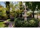 Ornate fountain in a landscaped front yard at 4528 E Hobart St, Mesa, AZ 85205