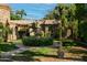 Landscaped front yard with fountain and lighting at 4528 E Hobart St, Mesa, AZ 85205
