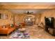 Open living area with a stylish sofa and views of the kitchen at 4528 E Hobart St, Mesa, AZ 85205