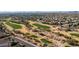 Aerial view of a golf course and surrounding residential area at 5246 E Estevan Rd, Phoenix, AZ 85054