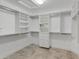 Large walk-in closet with ample shelving and drawers at 8816 W Topeka Dr, Peoria, AZ 85382