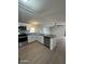 Modern kitchen with island and stainless steel appliances at 9431 E Coralbell Ave # 32, Mesa, AZ 85208