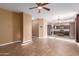 Open living room with kitchen views and tile floors at 1007 E Sunland Ave, Phoenix, AZ 85040