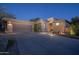 Attractive single-story home with a two-car garage and well-manicured landscaping at 11233 E Butherus Dr, Scottsdale, AZ 85255