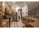 Modern kitchen with stainless steel appliances and ample counter space at 11233 E Butherus Dr, Scottsdale, AZ 85255