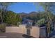 Outdoor kitchen and patio with mountain views at 11233 E Butherus Dr, Scottsdale, AZ 85255