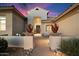 Elegant entryway with a walkway and potted plants at 11440 E Winchcomb Dr, Scottsdale, AZ 85255