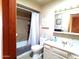 Clean bathroom with shower/tub combo, vanity, and mirror at 1344 E Victoria View St, Queen Valley, AZ 85118