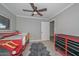 bedroom with bunk bed and storage at 13802 N 64Th Pl, Scottsdale, AZ 85254