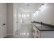 Spa-like bathroom with double vanity, soaking tub, and marble flooring at 22538 W Pecan Rd, Buckeye, AZ 85326