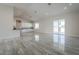Open living space with tile floors and sliding glass doors at 22538 W Pecan Rd, Buckeye, AZ 85326